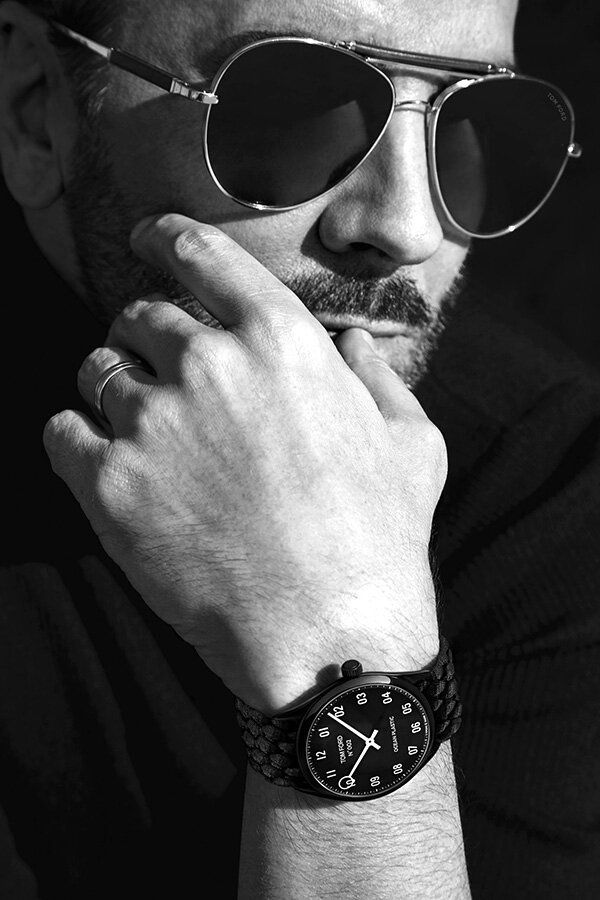 Tom Ford. Deep in thought? Or channeling THIS SONG?