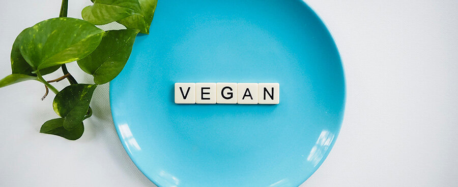 vegan spelled out on a plate