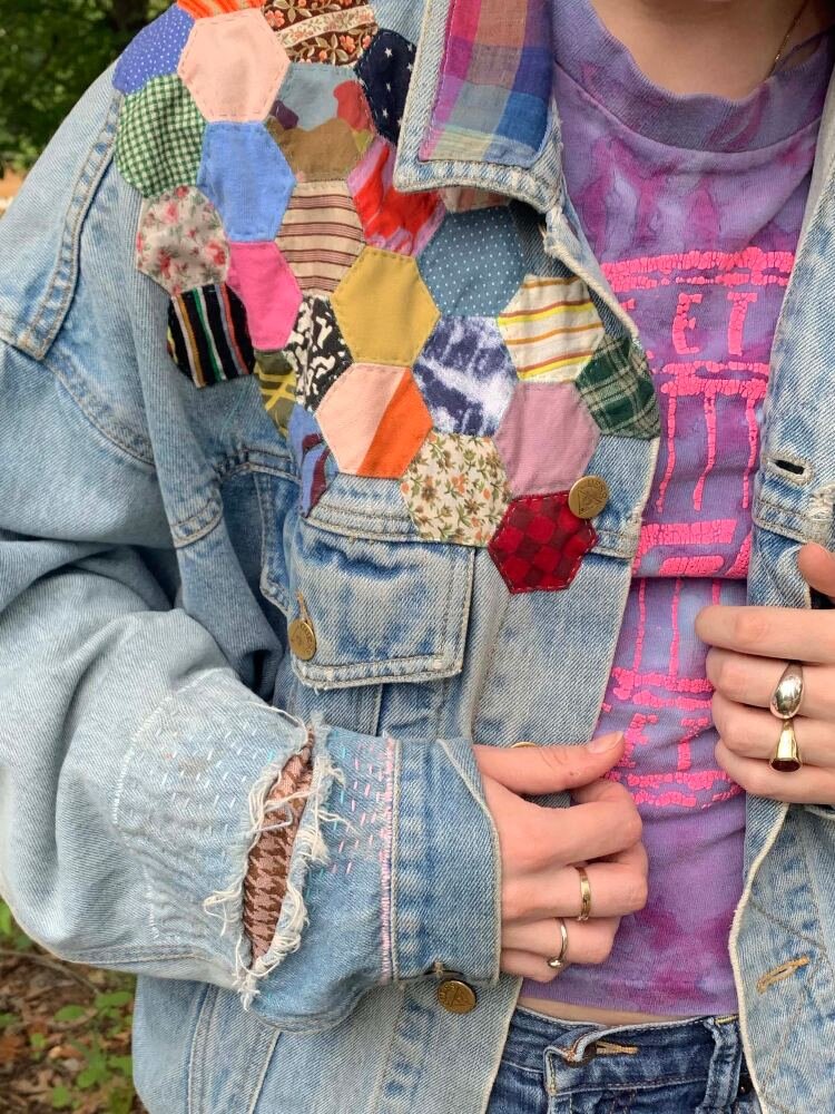 Lily’s well worn and mended denim jacket