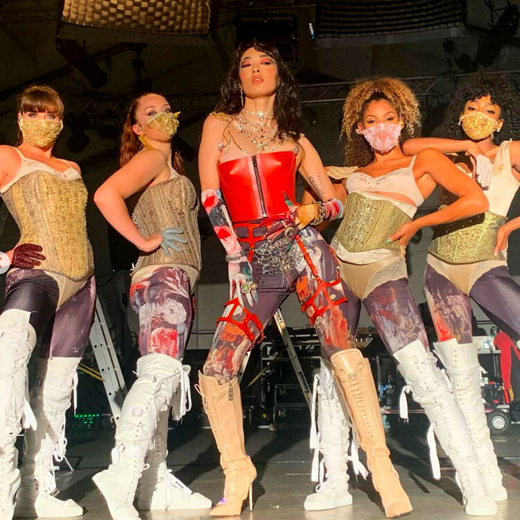 Rina Sawayama on the tonight show rocking a red corset with several backup dancers in corsets as welll