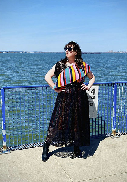 Thrift style influencer Kaitline of The WindyCityThrifter shares her style tips black lace and colorful striped top