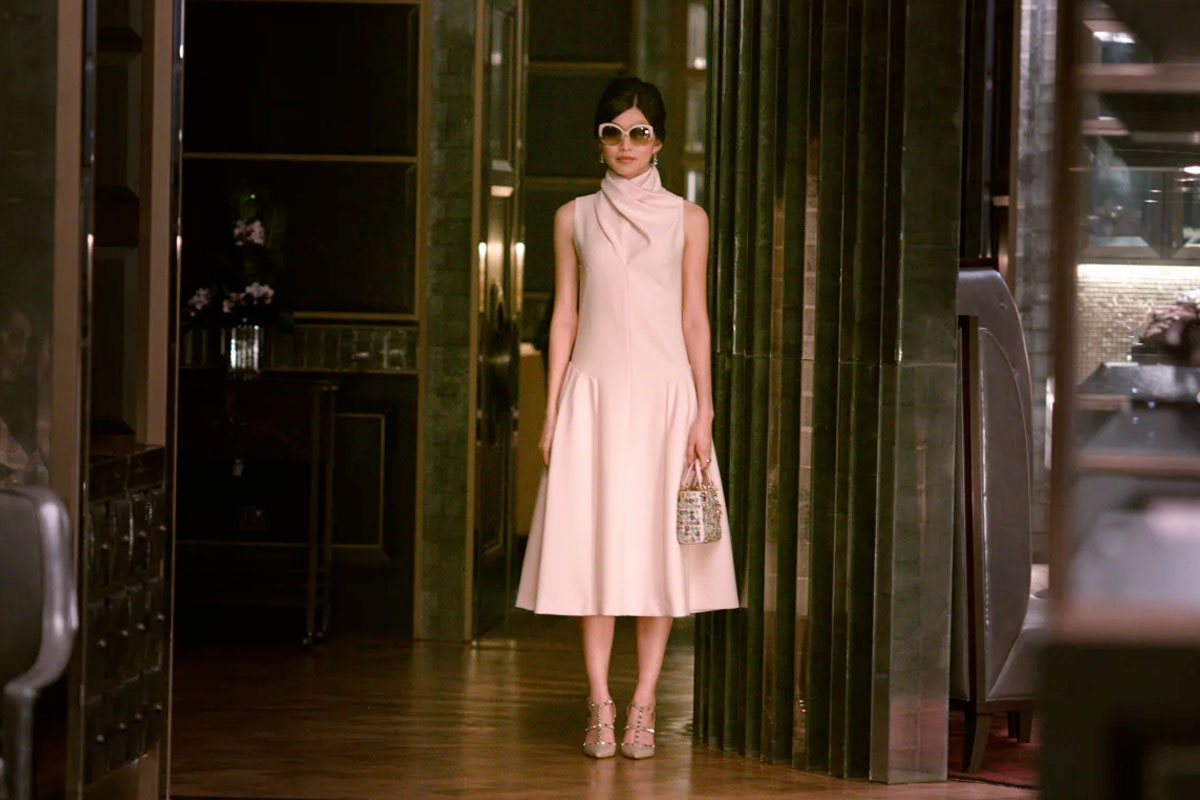 character from Crazy Rich Asians in pink dior dress