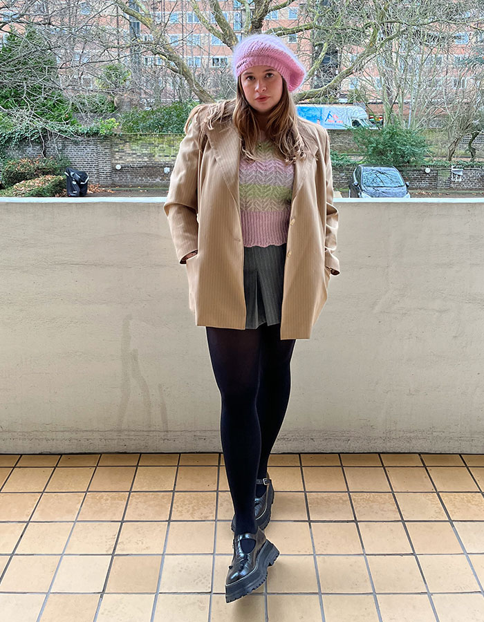 look two camel blazer with tights and pink hat
