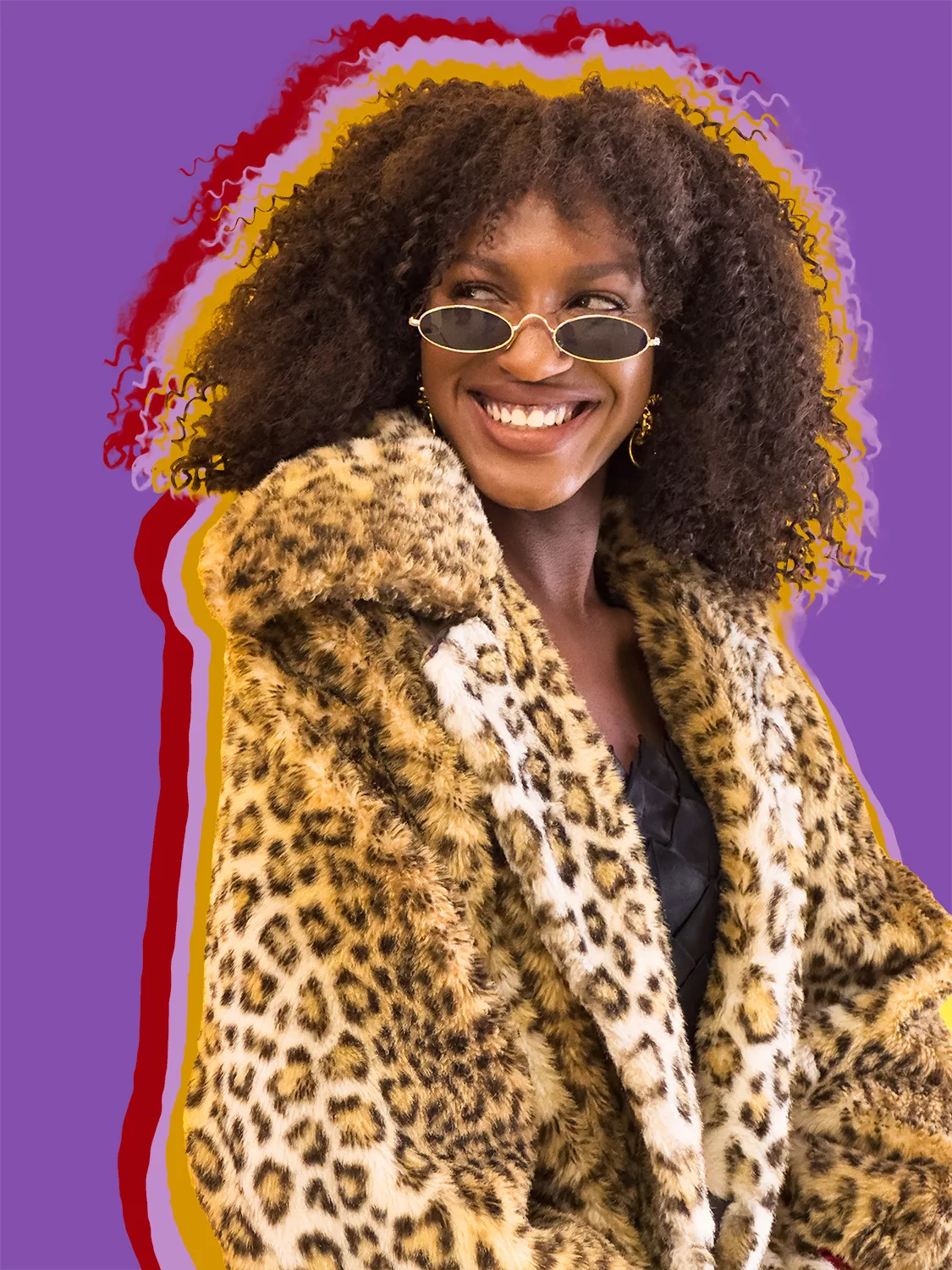 Model wearing faux fur leopard coat by vintage nubian