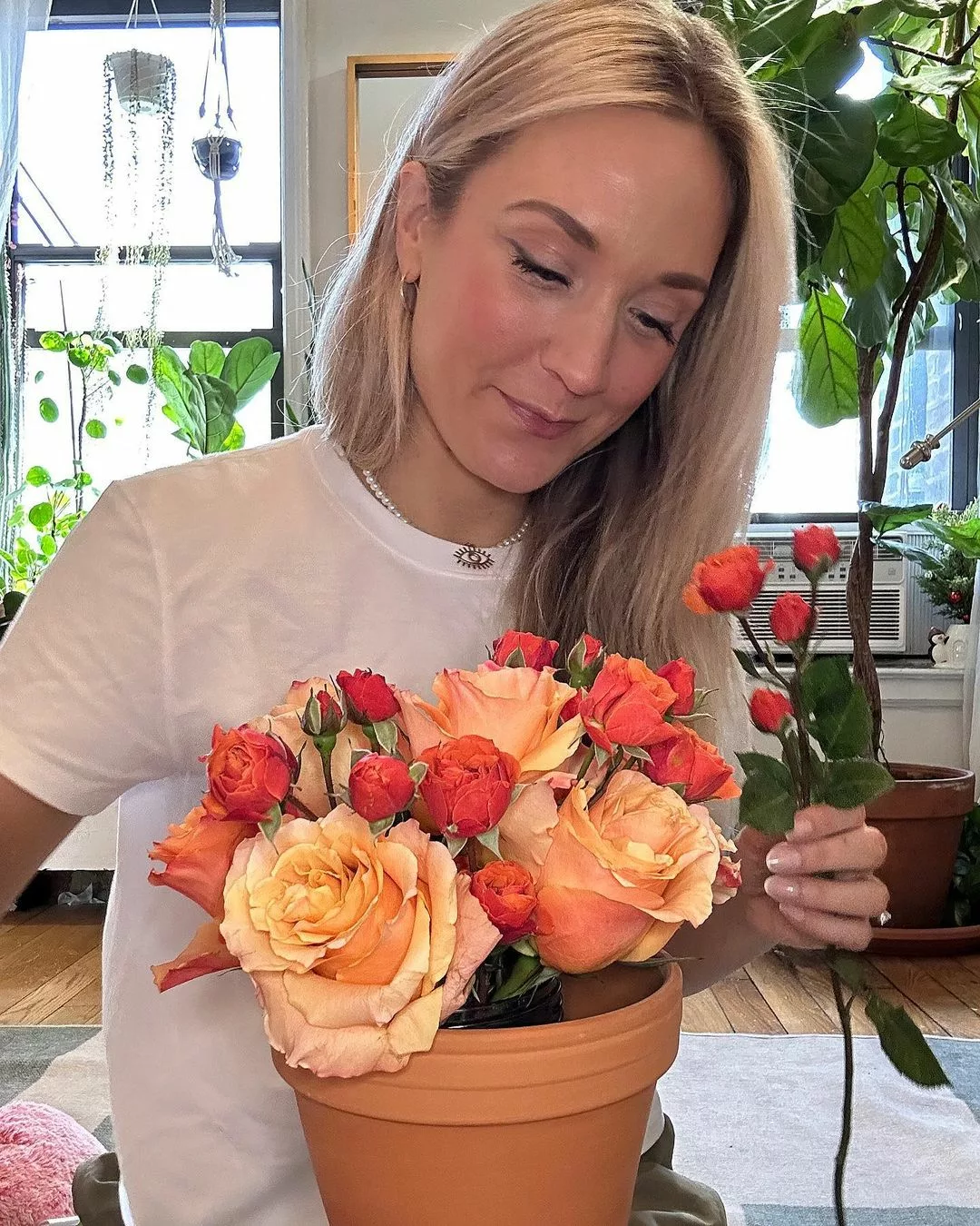 queer plant expert Ciara Benko arranging flowers