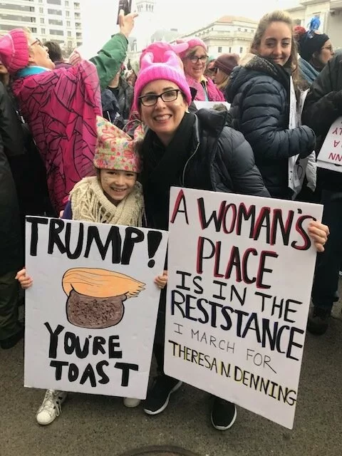 avery with her mom elizabeth at a protest