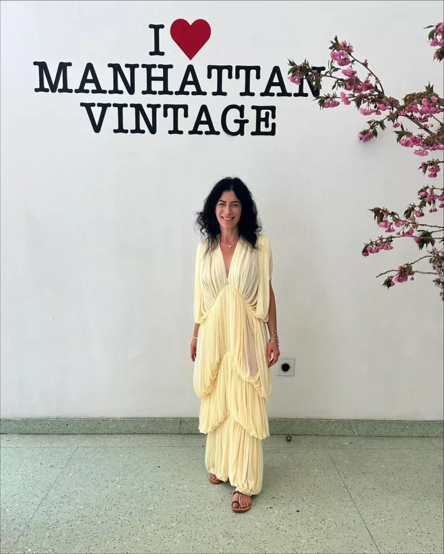 Amy Abrams in a long yellow vintage gown