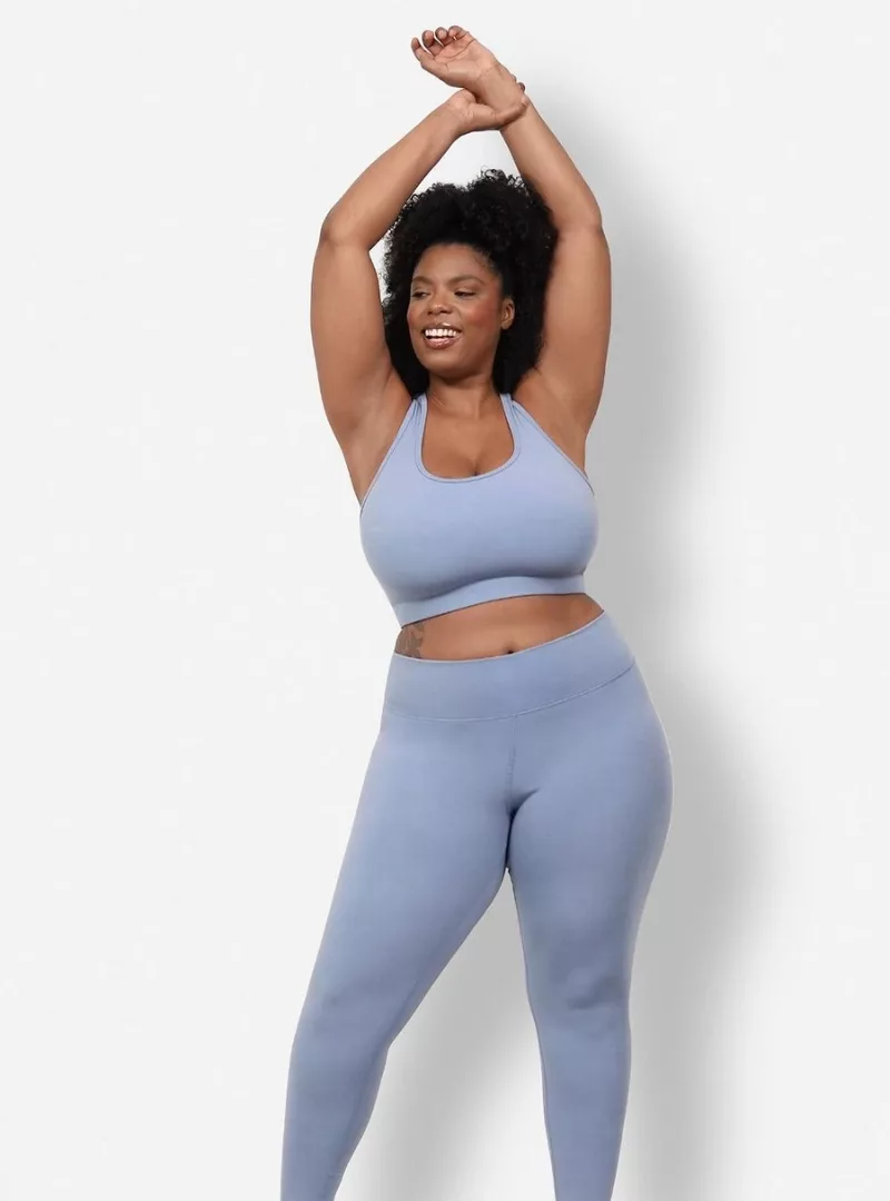 plant based leggings and sports bra on plus sized model by reprise
