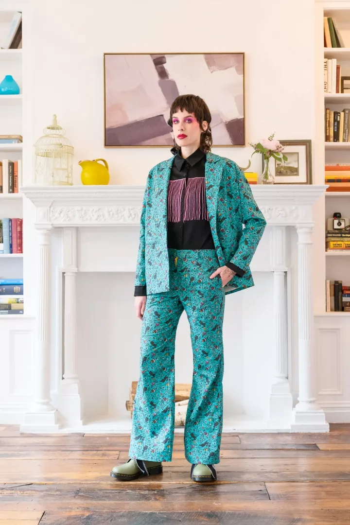 A model in a printed turquoise suite in MELKE collection.